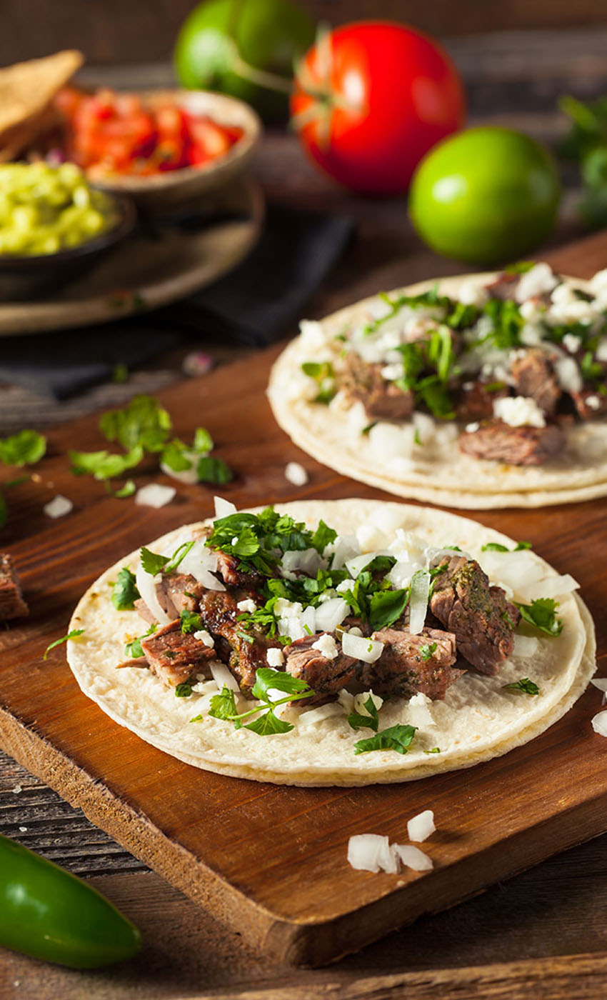 Homemade Carne Asada Street Tacos with Cheese Cilantro and Onion